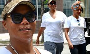 Queen Latifah and partner Eboni Nichols take a leisurely stroll in New York 