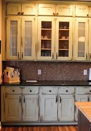 Old World Cabinets From Shiloh Matched With Beautiful Modern Glass Tile Oldmeetsnew Rustic Kitchen New Kitchen Modern Glass Tile