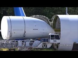 Boeing 747 background and development. Unloading A Boeing Dreamlifter 747lcf Jumbo Jet Kpae Paine Field Youtube