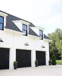 See more ideas about farmhouse garage, farmhouse exterior design, modern garage doors. Mod Farmhouse Style Carriage House Simple The Cheapest You Can Get White Metal Doors Painted Garage Door Design Modern Farmhouse Exterior Farmhouse Garage