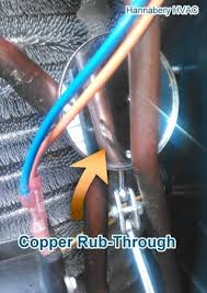 Hvac tech cleaning air vents during yearly routine service. How Often Should I Have My Equipment Serviced Hvac Faq S