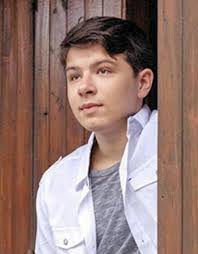 Nicholas "Nick" Satoshi Caron