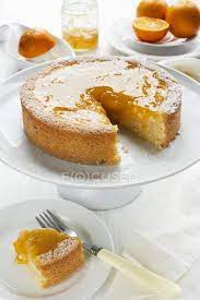 (man kann es auch mit orangensaft aufgießen) 300g. Orangenkuchen Und Frische Orangen Susswaren Leckereien Stock Photo 153739324