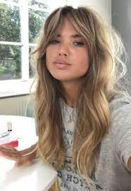 The front is cropped in a way that it sweeps covering the eyes while the rest of the hair is trimmed in fun layers. Pin On Hair Styles
