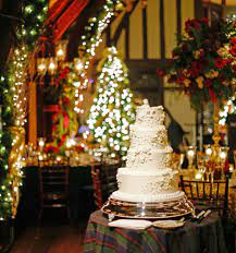 This evergreen christmas theme features red and green colors sprinkled with whimsical holiday decor and ornamentation for a traditional look that never goes out of style. Festive Decor For Weddings With A Holiday Or Christmas Theme