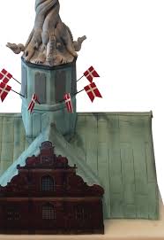 The historic building is situated next to christiansborg palace, the seat of the danish parliament. Firmakage Formet Som Borsen Kagekompagniet