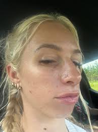 What skincare products and routines can help reduce oiliness