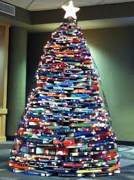 20 Insanely Creative Bookish Christmas Trees Christmas Tree Made Of Books Book Christmas Tree Alternative Christmas Tree
