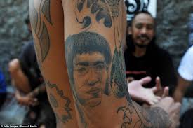 Indonesian language tattoo, what's your translation? Skin And Bare It Tattoo Artist In Indonesia Shows Off Ink Craft To Help Promote Ancient Tribal Tattoo Heritage Of Country S Indigenous People Daily Mail Online
