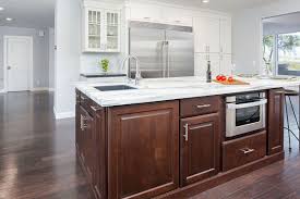 Montage Of Photos Of Modern Kitchen With White Recessed Panel Cabinets Along Wall And Traditional Cherry Timeless Kitchen Raised Panel Cabinets Kitchen Design