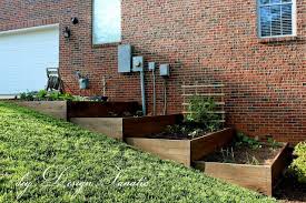 Diy Design Fanatic Raised Beds Raised Bed Garden Design Sloped Backyard Sloped Garden