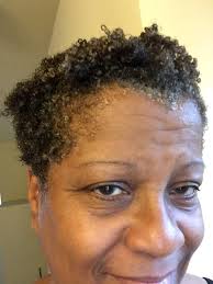 Good night Phamily this how I keep my curls moist my plastic cap with  Photogenic conditioner and water😊