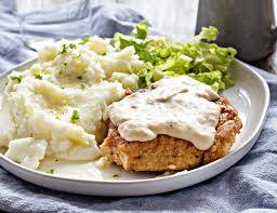 Pan fried pork chops with a sweet apple maple glaze is a quick and easy main dish. Country Fried Pork I Am Homesteader