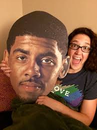 Fans pose with life-size Kyrie after victory