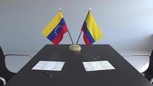The colors are taken from the flag of the former federation gran colombia, whose member was venezuela along with colombia. Flags Of Venezuela And Colombia On The Table By Moovstock Videohive