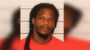 Man charged with shooting into card game, killing player