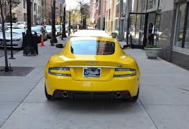 Image result for Sunburst Yellow 2017 Aston Martin