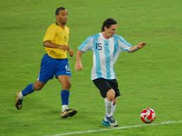 A brazilian defender throwing the ball before the argentine player laguna reaches it, during the argentina v. Argentina Brazil Football Rivalry Wikipedia