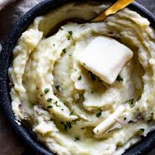 While the potatoes are boiling, mash the two cloves of garlic and set aside. Creamy Garlic Mashed Potatoes Recipe Went Here 8 This
