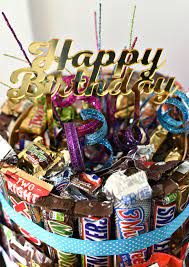 Browse our 40 birthday gift ideas for the ultimate pick or shopping inspiration. How To Make A Chocolate Candy Cake Fun Squared Chocolate Candy Cake Candy Bar Birthday Birthday Candy Bouquet
