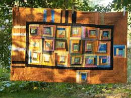 A log cabin quilt block is a traditional quilt block that can be made in many different variations while a log cabin block can be either regular pieced or paper pieced, toby shows how to create the block guidelines for creating great quilt borders. Machine Quilting Designs For Log Cabin Quilts Craftsy