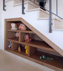 Oct 20, 2020 · the shelves here are positioned on either side of the window, creating storage nooks for books and other items and freeing this small bedroom of other more bulky furniture pieces. 40 Under Stairs Storage Space And Shelf Ideas To Maximize Your Interiors In Style