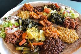 This is usually in the form of wat, a thick stew, served on top of injera , a large sourdough flatbread, which is about 50 centimeters (20 inches) in diameter and made out of fermented teff flour. 6 Vegan Friendly Ethiopian Restaurants In Los Angeles