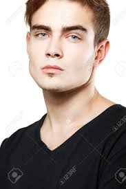 Young Man Handsome Face Closeup, Sexy Guy Looking At Camera Over White  Background Stock Photo, Picture and Royalty Free Image. Image 18207635.