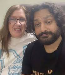 Just two people loving each other and looking amazing while they do it!  Well, she looks amazing and I just stand close to her.