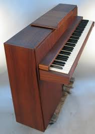 Her parents purchased the piano and had it crated and shipped to the states making, as she said, the best birthday ever. Danish Teak Piano By Andreas Christensen At 1stdibs