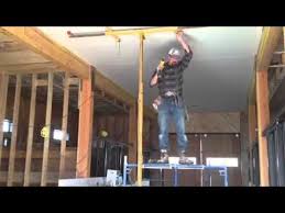 How I Hang Sheetrock Drywall On The Ceiling By Myself Or Yourself Diy Youtube Sheetrock Ceiling Maine House Installation
