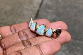 The Grillz Glozzary 9 Styles You Should Know In 2020 Grillz Teeth Jewelry Gold Teeth