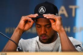 Anthony Joshua's been paying £2,000 to sit in the darkness for days,  getting cosy with a British hairdresser and his 'cupping' treatment has  gone viral: Here's how he became a stadium-filling heavyweight