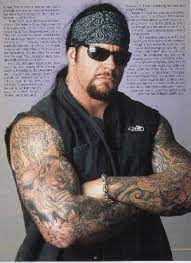 Sara callaway he has many tattoos. Undertaker