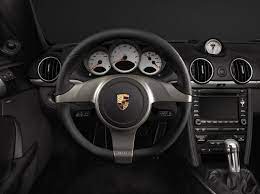 Porsche Cayman S 2010 La Innovacion Interior De Porsche Presente En Cada Detalle Bugatti Veyron Bugatti Porsche Cars