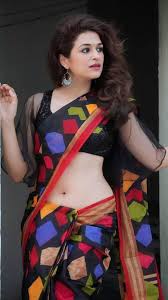 South indian actress swetha jadhav in half saree, lehenga and designer blouse showing off her waist beauty, back and navel. Shraddha Das And Her Unending Love For Sarees Times Of India