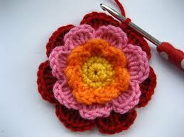 Making sure your short piece, the tail, is on top of the long yarn. Attic24 Triple Layer Flower