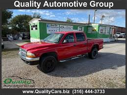 Image result for Dark Garnet Red 2002 Dakota