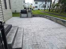 Connect with local contractors on your terms. R Stamped Concrete Patio Seating Wall With Flagstone Caps And Dropped In Grill Traditional Patio Other By Haijoe Stamped Concrete Patios And Decks Houzz