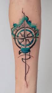 The compass embodies finding one's own way to do something or to be you, and the watercolor adds. Compass Tattoos Main Themes Tattoo Styles Ideas