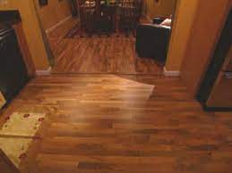 Changing the direction of floorboards makes for an easier transition between rooms. Install Tongue And Groove Wood Veneer Flooring Hgtv