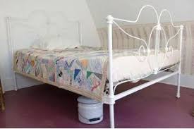 How To Clean An Old Iron Bed Ehow Wrought Iron Bed Frames Iron Bed Frame Iron Bed