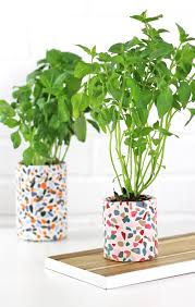 White hydrangeas in diy dripping paint can planters use contrast to add depth to the overall look of each styled vessel. 9 Diy Planters To Perk Up Your Indoor Jungle Hello Nest