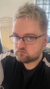 Should I dye my hair jet black or red?