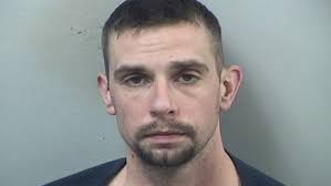 Man arrested in home invasion investigation