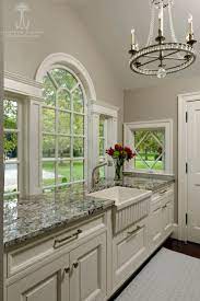 the butler s pantry offers copious countertop space and great storage the palladian window is kitchen bathroom remodel kitchen remodel kitchen and bath design