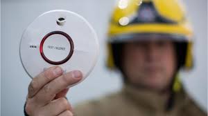 There are three plastic tabs/clips that can be released. Chirping Smoke Detector It May Not Be The Battery That S Gone Bad