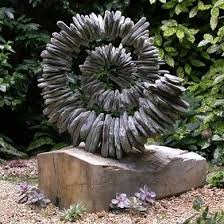 Slate Ammonite On Aged Oak Skulpturen Garten Gartenskulpturen Und Steingarten Ideen