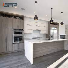 Newly stained wood floors, cabinetry painted gray before: China Canadian Style Two Tone Color Light Grey Oak And White Gloss Kitchen Cabinet With Waterfall And Island China Kitchen Cabinets Kitchen Products