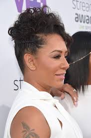 English pop singer/songwriter and actress best known as the sporty member of the spice girls. Hair Crush Mel B